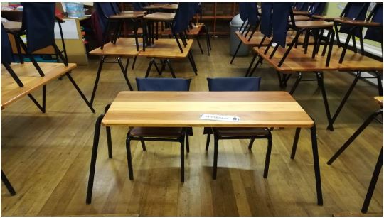 Desks and chairs in rows in a Foundation Phase classroom