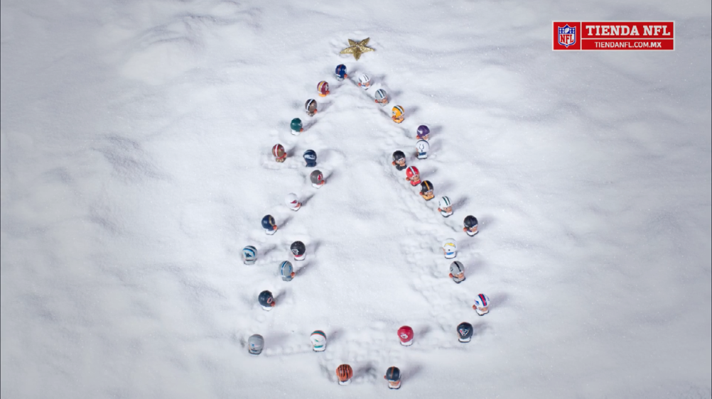 The NFL toys make a Christmas tree in the snow