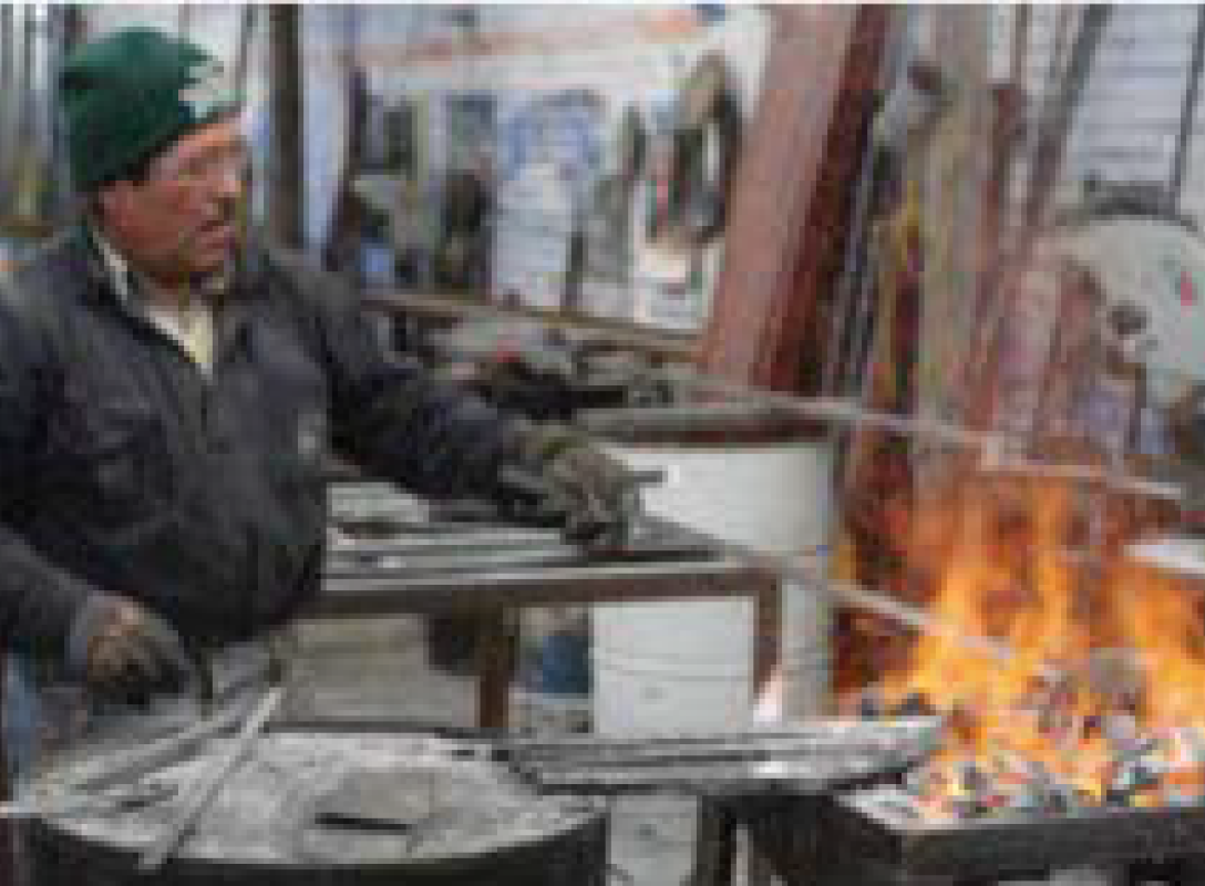 Traditional metal work at Taracea for creating unique finishes on metal legs