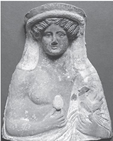 Busto de terracota (pr&oacute;tomo) de Dioniso sosteniendo un huevo y un gallo.