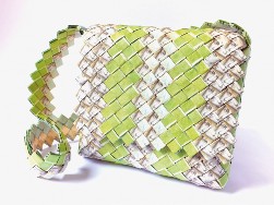 Purse made entirely of money by Venezuelan artisans in Cúcuta, Colombia. Collected in 2018 by Art For Impact.