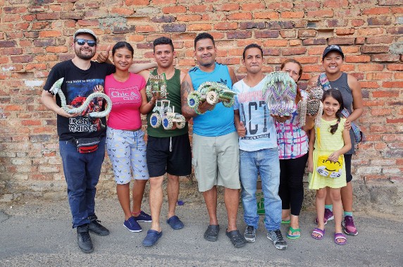 Some members of Art For Impact pose with a group of Venezuelan money artists in Cucuta.
