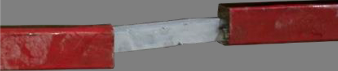 State of deformation of the device under severe inelastic demands
								(after the end of test 4)