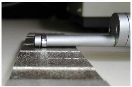 Machined surfaces and profilometer.