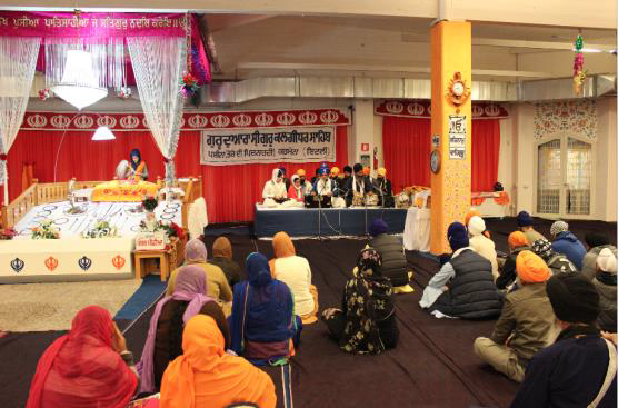 Kīrtan performance on Saturday night; Gurdwārā in Pessina Cremonese, 28 March 2015. Photograph: Thea Tiramani.