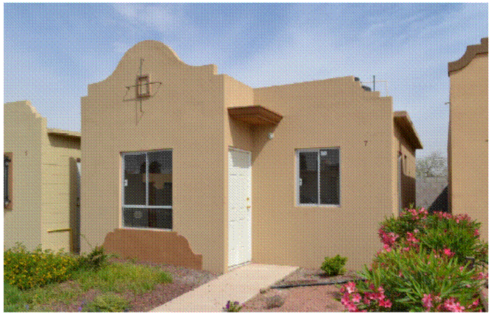 The house, showing the main facade (South wall) used for the measurements