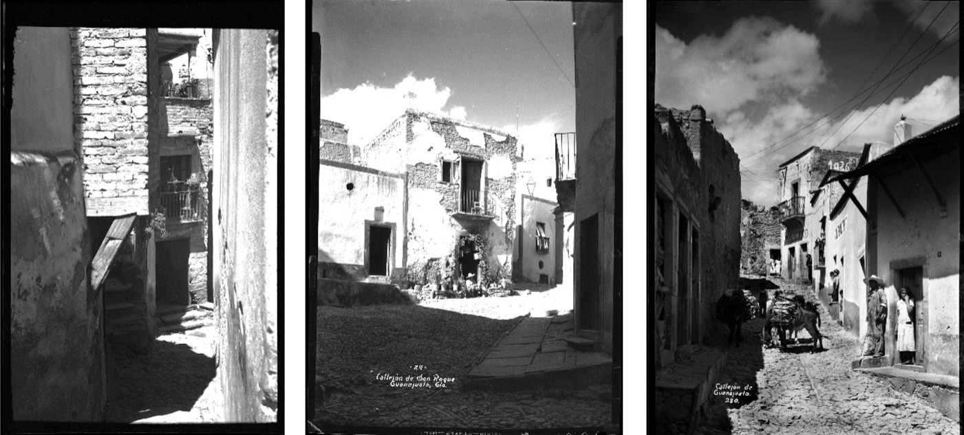 Viviendas populares en callejones con estructuras sencillas de adobe y techos de vigas de madera.