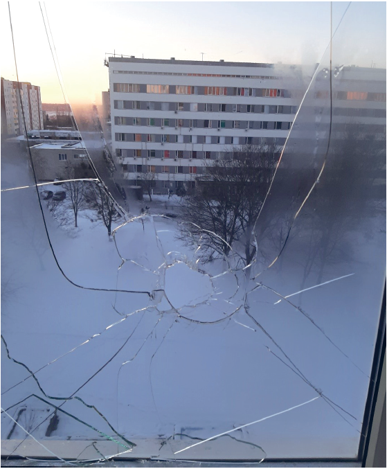 A view through the damaged window from the operative theatre