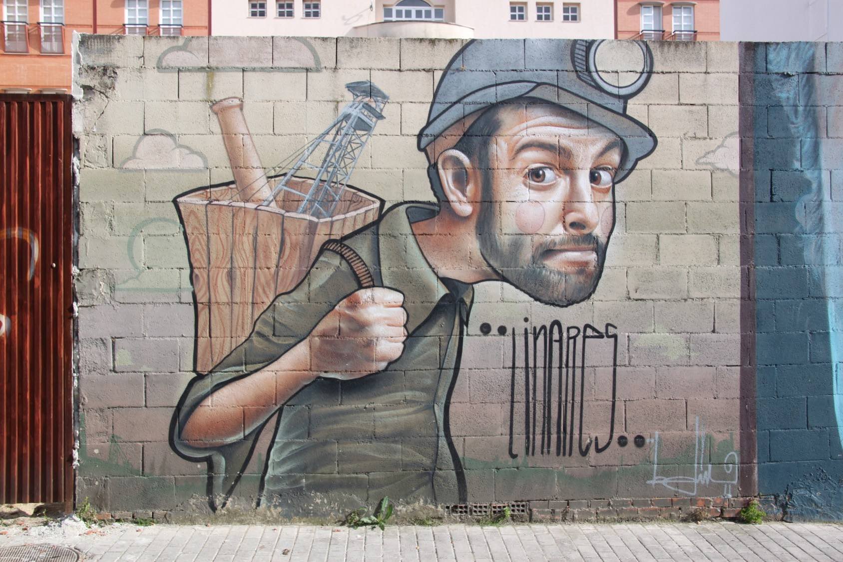 Obra de Belin en la que se autorretrata como un minero. Calle Zambrana, Linares.