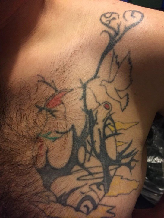 Tatuaje en torso de DQ