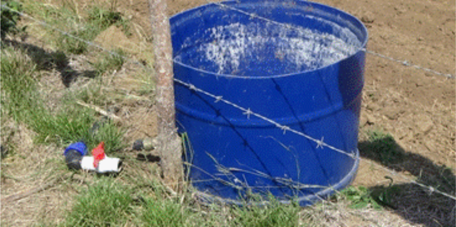 Plastic tank conditioned for use in the supply of water to livestock.