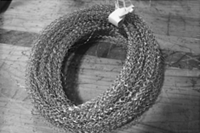 Alambre
rizado con el dispositivo